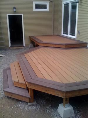 Finished angled wood deck with steps