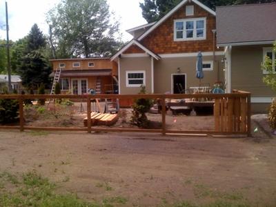Wood privacy fence around a backyard