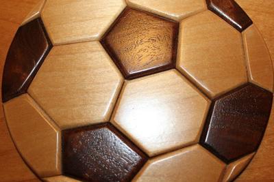 Close-up of the inlaid wood soccer ball pattern