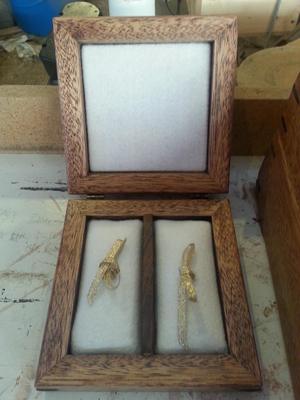 Rustic wood frame holding keepsakes