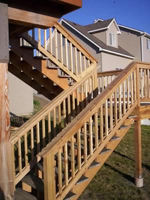 Wood stairs and railings on the two-story deck